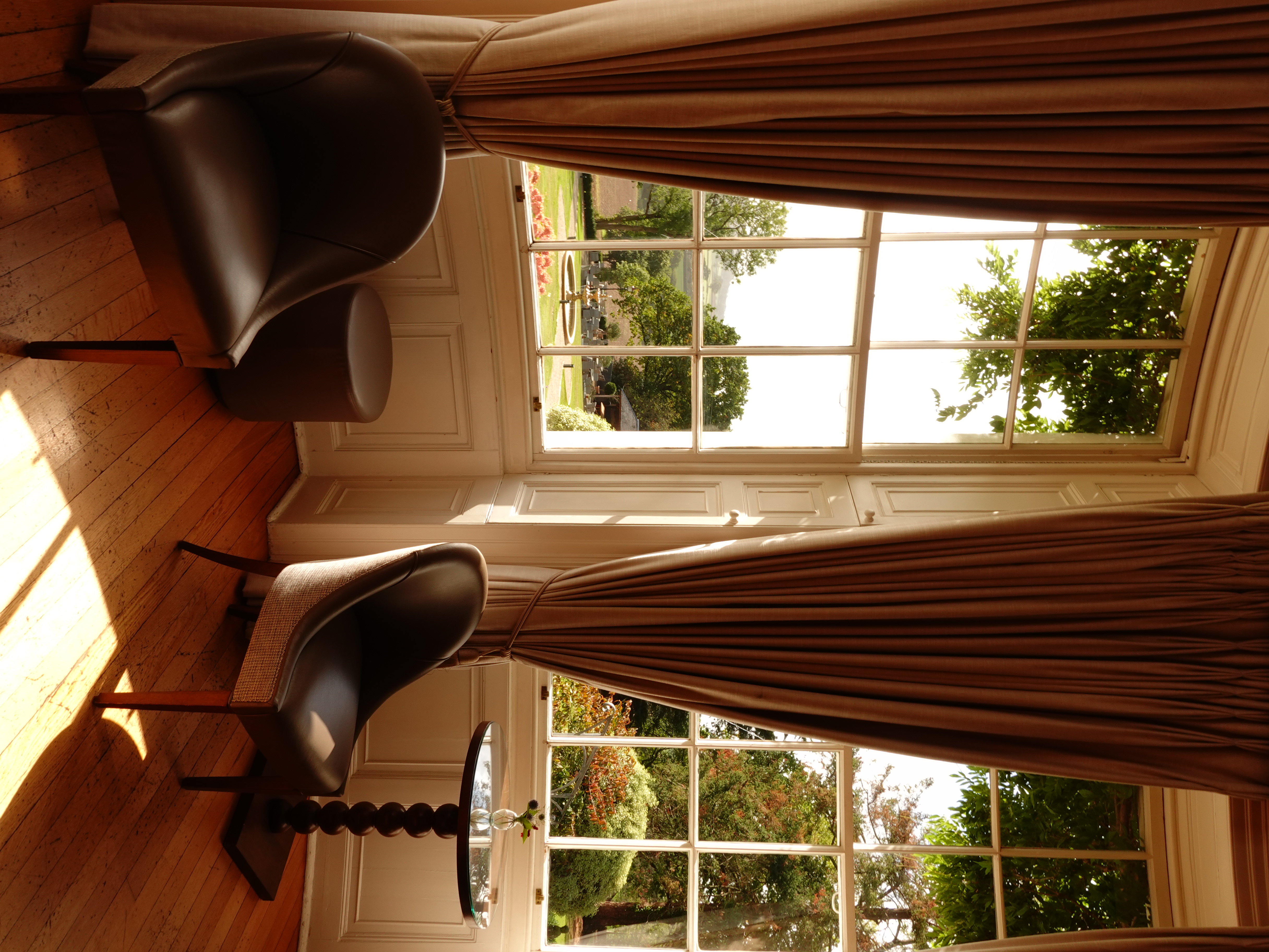 Sunlit wedding venue windows and seating